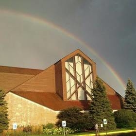Holy Family under rainbow